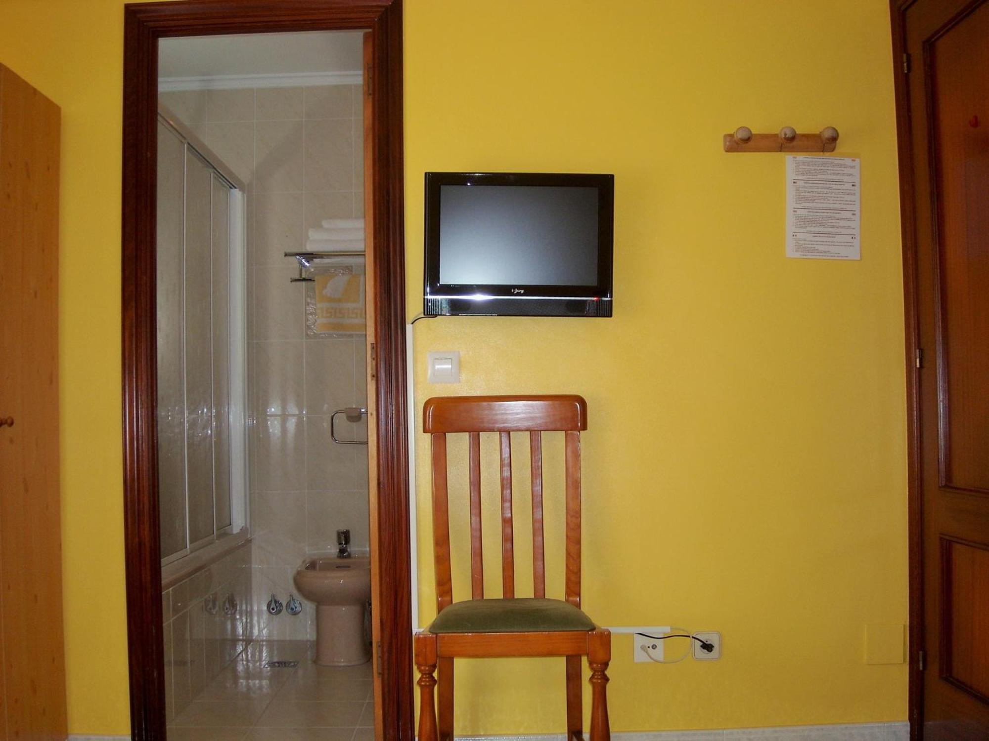 Hostal Santa Marta Playa Байона Стая снимка